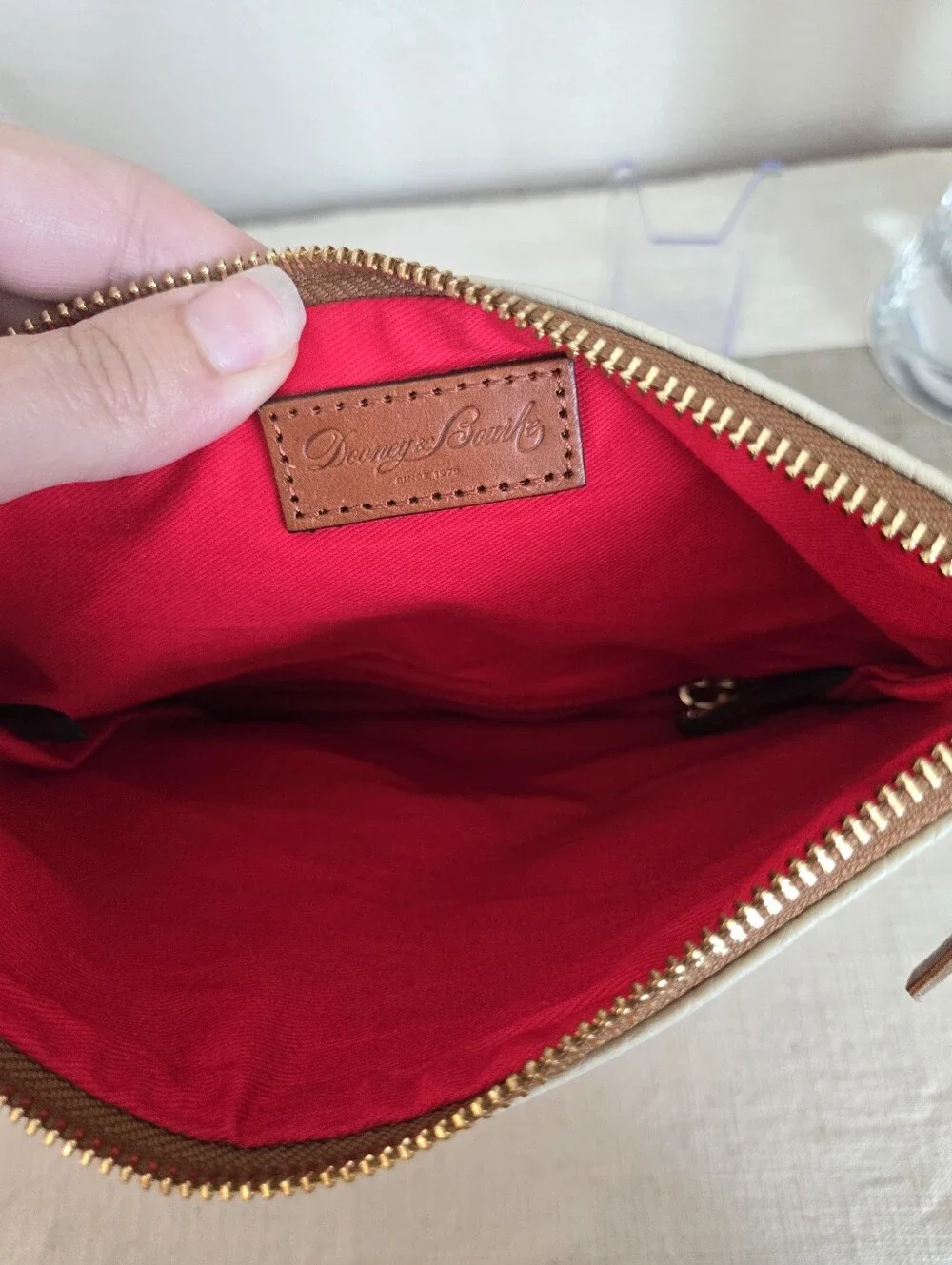 Dooney & Bourke Ivory Fold-Over Pebble Leather Clutch